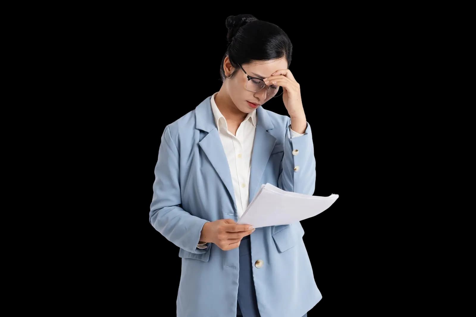 An overwhelmed condo property manager reviewing paperwork